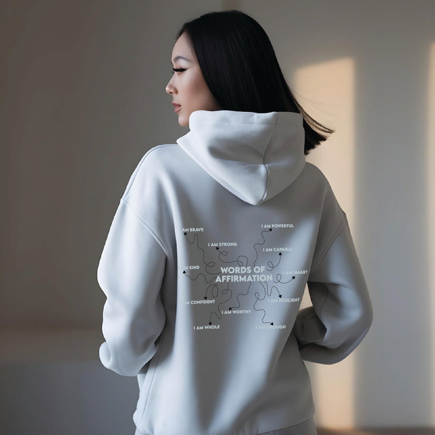 Sweat à capuche avec des mots d'affirmation
